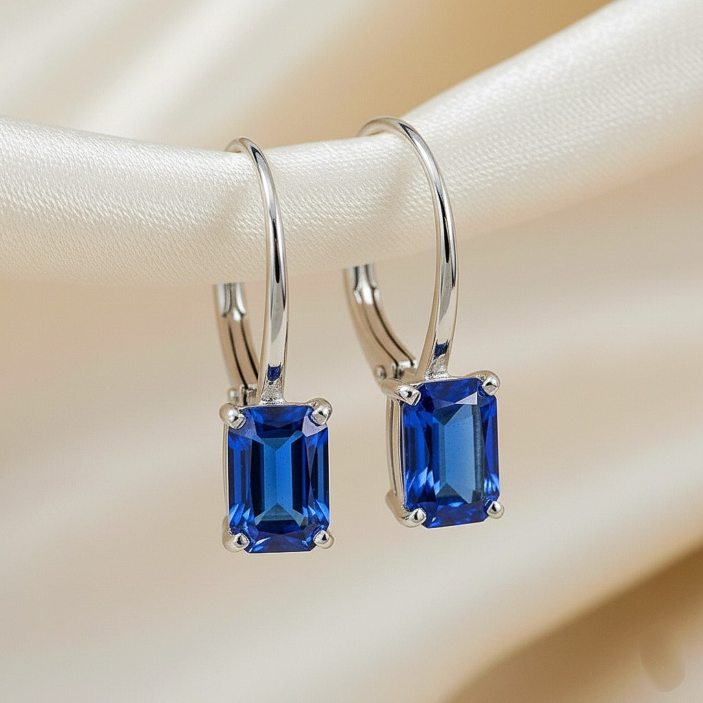 Luxureen Emerald Cut Lab Sapphire Dangle Earrings